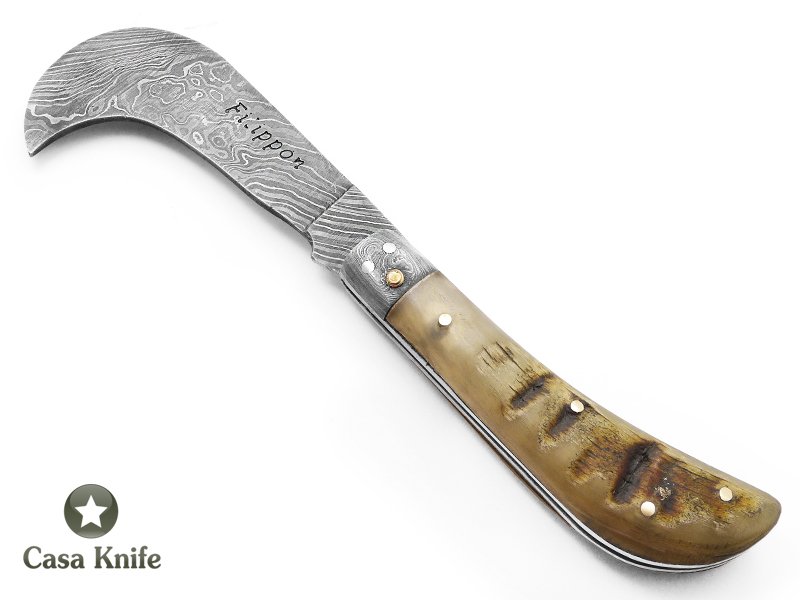 Adelar Filippon Britola para colecionador em aço damasco com empunhadura em chifre de carneiro 18 cm