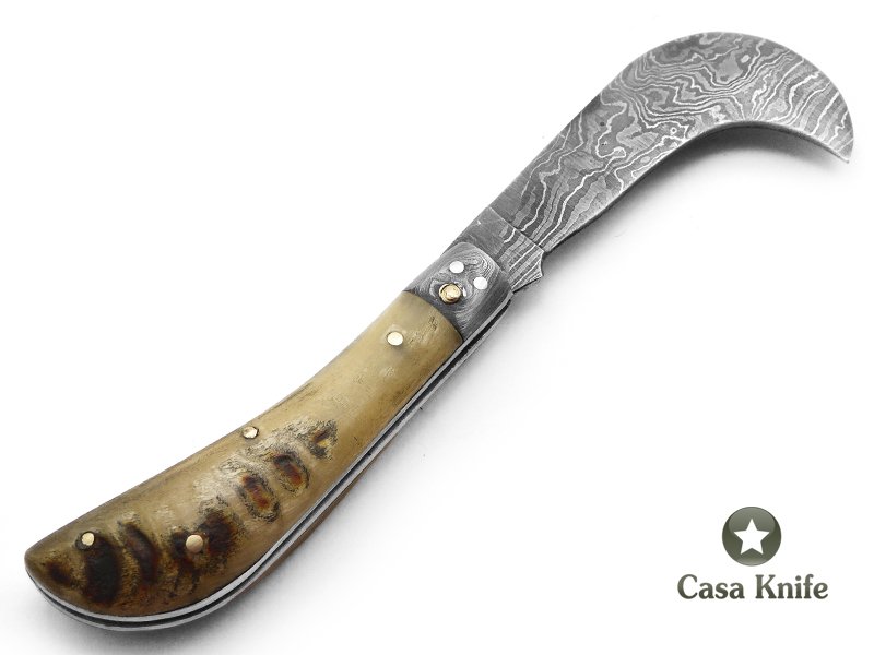 Adelar Filippon Britola para colecionador em aço damasco com empunhadura em chifre de carneiro 18 cm
