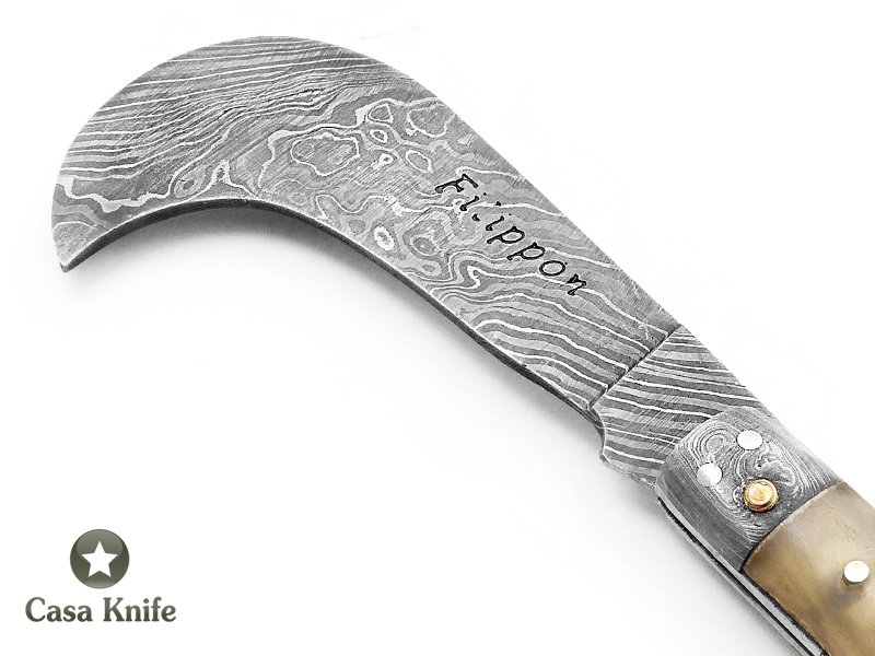 Adelar Filippon Britola para colecionador em aço damasco com empunhadura em chifre de carneiro 18 cm