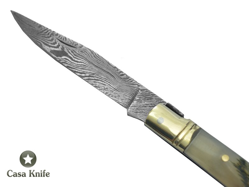 Canivete estilo laguiole para colecionador forjado em aço damasco. Empunhadura em Chifre de Carneiro, 16 cm