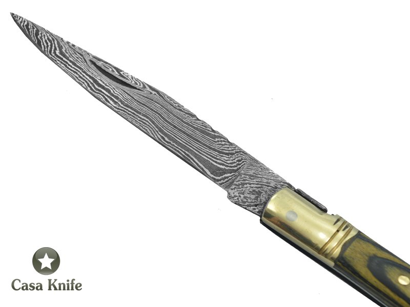 Canivete estilo laguiole para colecionador forjado em aço damasco. Empunhadura em Pakawood, 16 cm