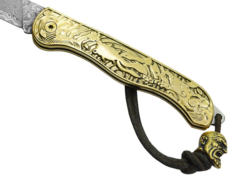 Canivete para colecionador em aço damasco. Empunhadura em bronze, 18 cm