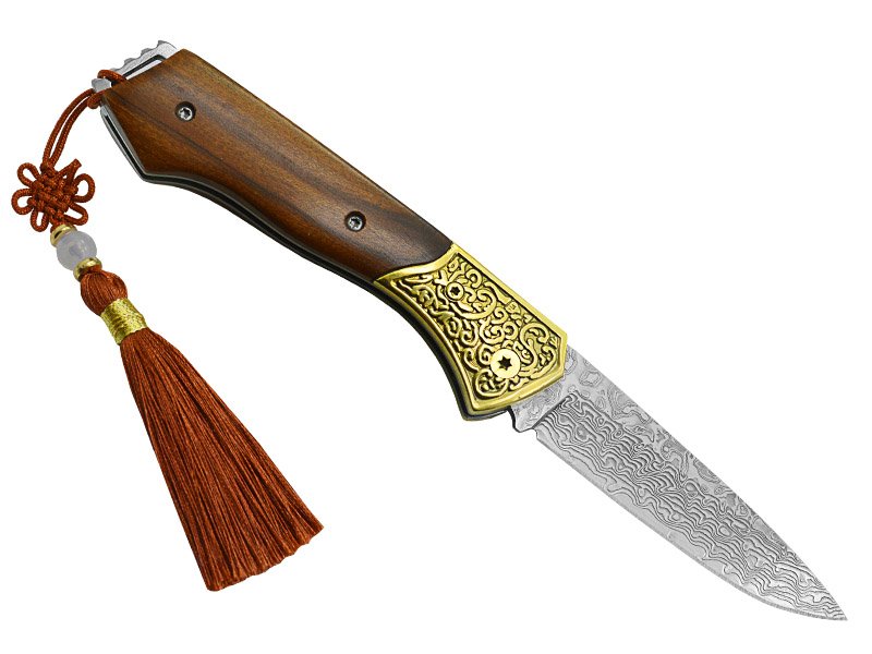 Canivete para colecionador em aço damasco. Empunhadura em madeira de sândalo, 18 cm