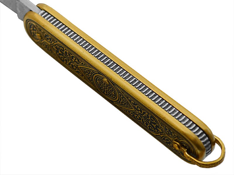 Canivete para colecionador forjado em aço damasco. Empunhadura em bronze, 13 cm