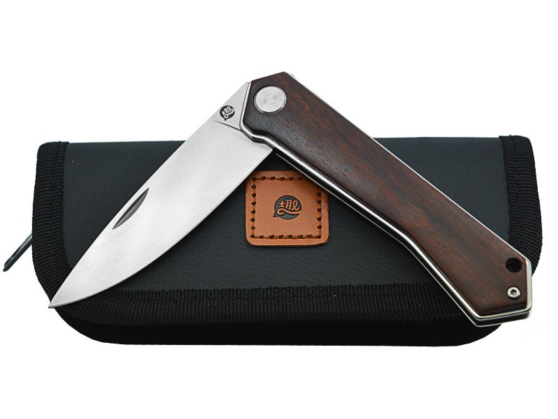 Canivete para colecionador forjado em aço inox. Empunhadura em jacarandá, 19 cm