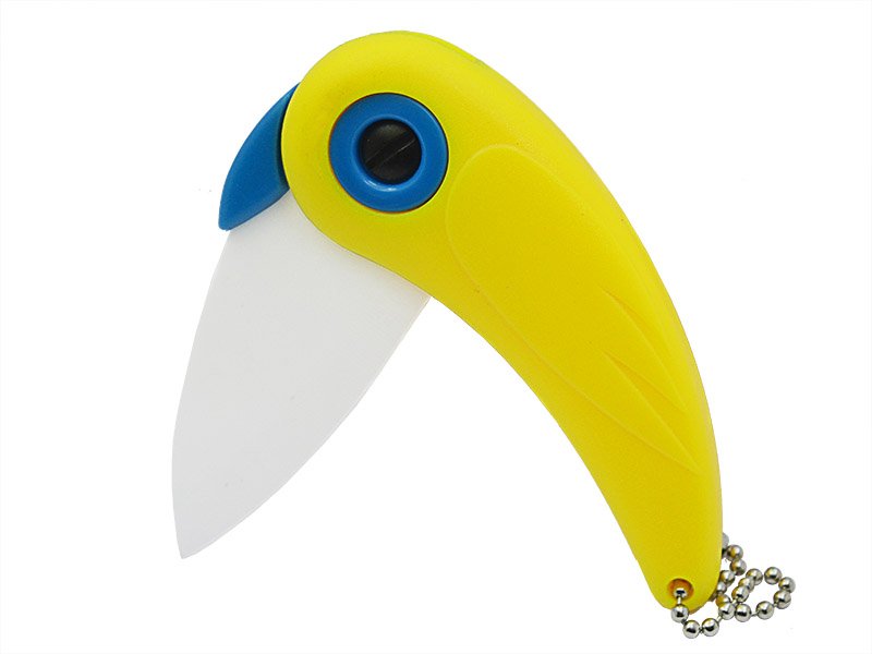 Canivete para descascar frutas com lâmina em cerâmica e empunhadura em PVC.
