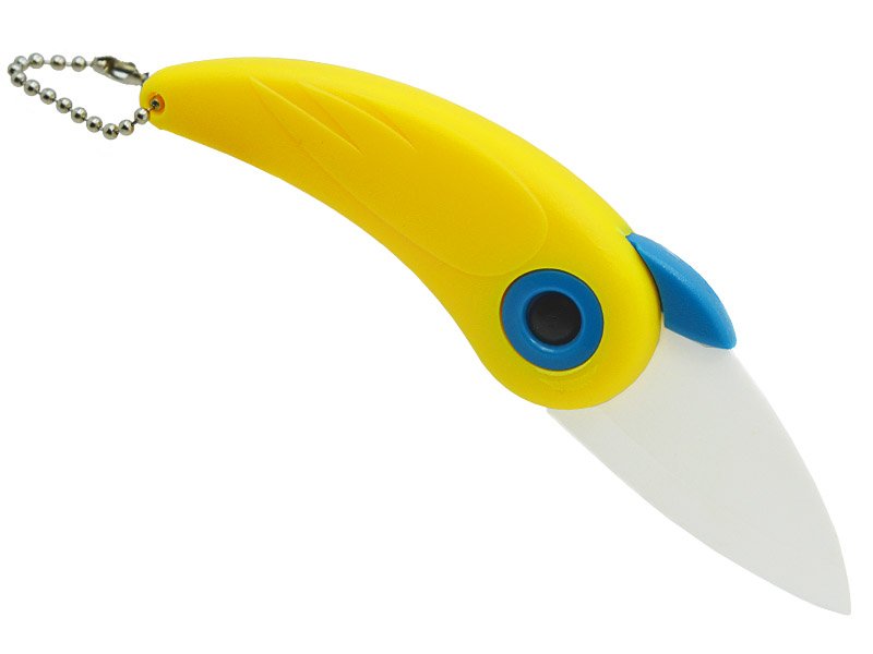 Canivete para descascar frutas com lâmina em cerâmica e empunhadura em PVC.