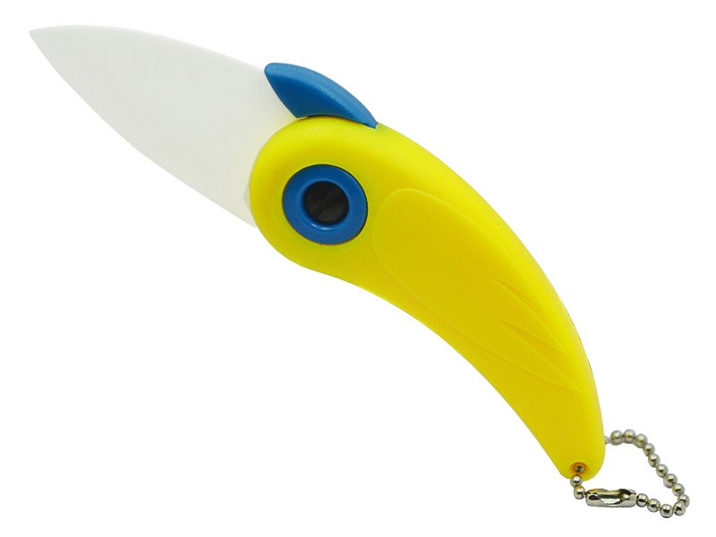 Canivete para descascar frutas com lâmina em cerâmica e empunhadura em PVC.