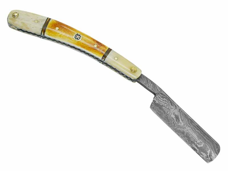Navalha para colecionador forjada em aço damasco. Empunhadura em osso de boi, 25 cm