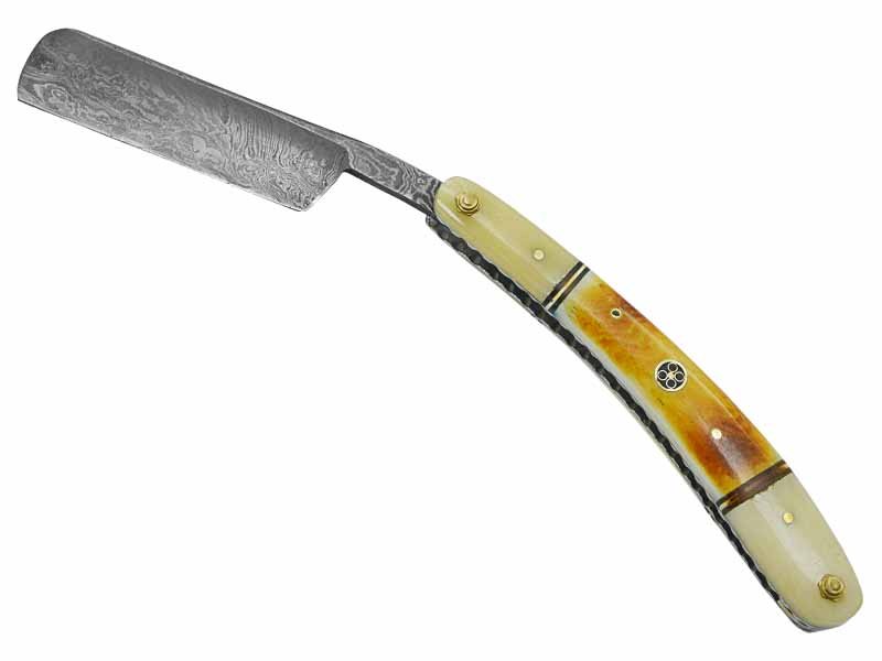 Navalha para colecionador forjada em aço damasco. Empunhadura em osso de boi, 25 cm