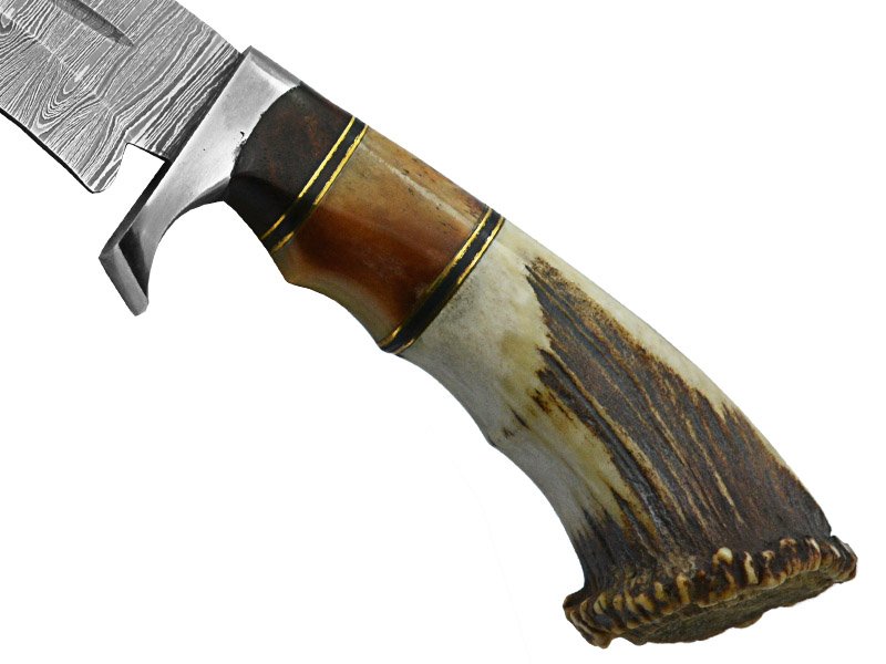 Faca Bowie para colecionador forjada em aço damasco. Empunhadura em osso de búfalo, 40 cm