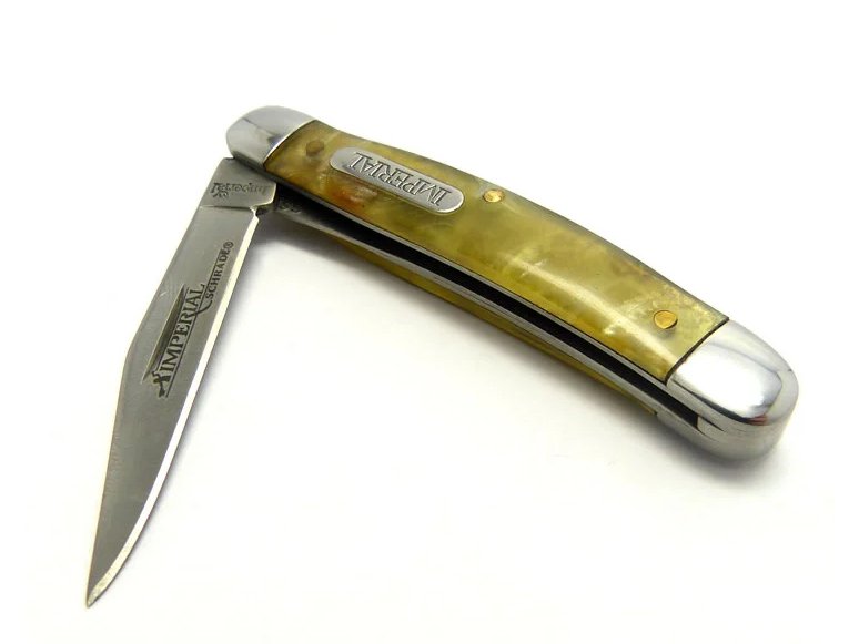 Imperial Schrade Canivete com uma lâmina em aço inoxidável e empunhadura em celulóide imitando chifre de carneiro 12 cm