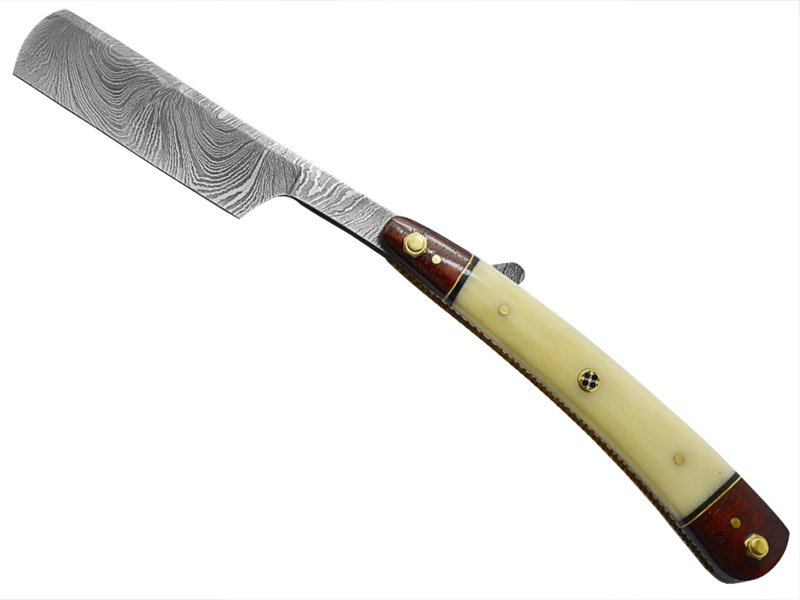 Navalha para colecionador em aço damasco. Empunhadura em osso de camelo e sândalo, 25 cm