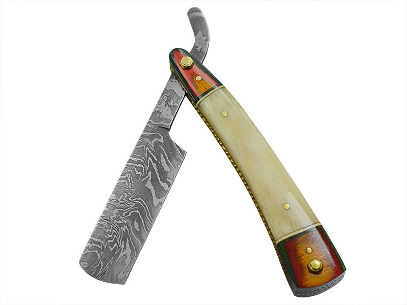 Navalha para colecionador em aço damasco. Empunhadura em osso de boi e Pakawood, 24 cm