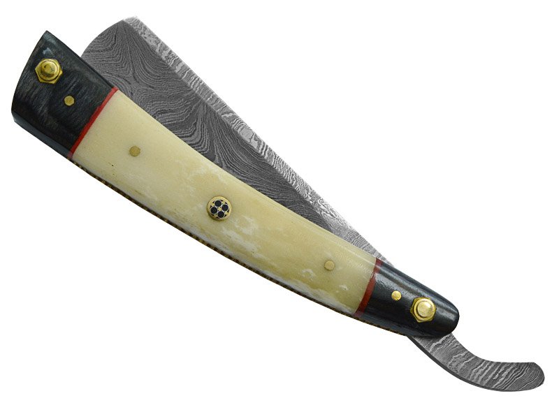 Navalha para colecionador em aço damasco. Empunhadura em osso de boi e Pakawood, 24 cm